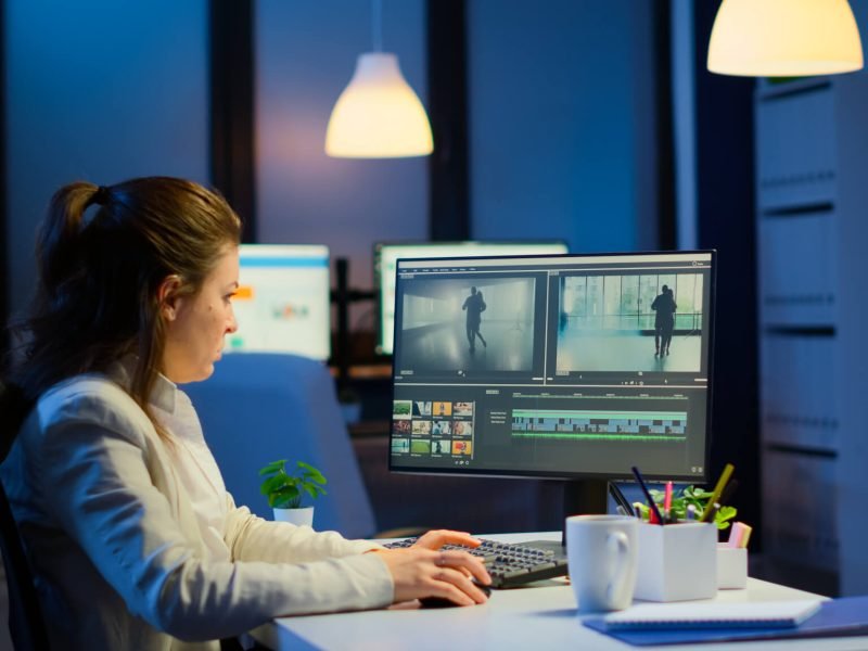 videographer-overworking-at-computer-from-business-office.jpg